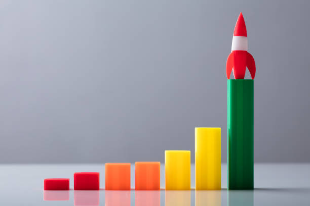 istock Close-up Of Red Rocket On Top Of Increasing Graph 949210992