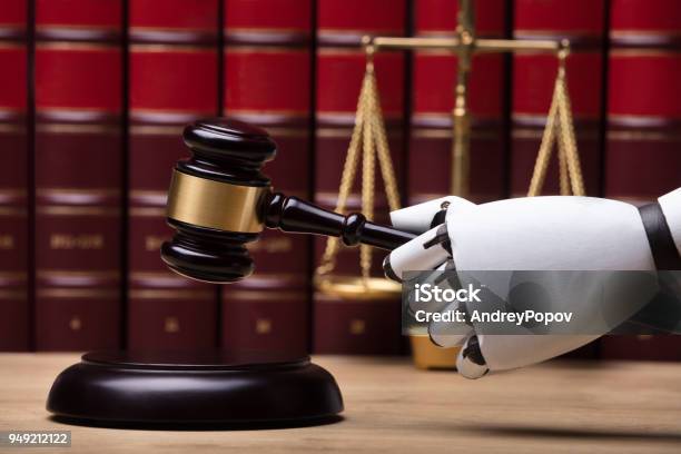 Robot Striking Gavel On Sounding Block Stock Photo - Download Image Now - Artificial Intelligence, Legal System, Law