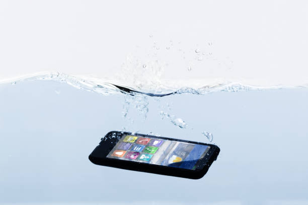 istock Mobile Phone Submerged In Water 949212282