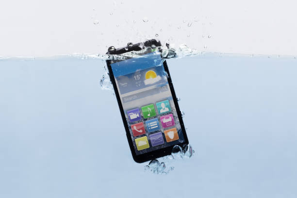 istock Mobile Phone Submerged In Water 949212294