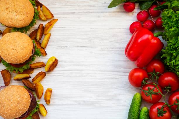 istock Healthy or unhealthy food. Copy space. Top view. 949212316