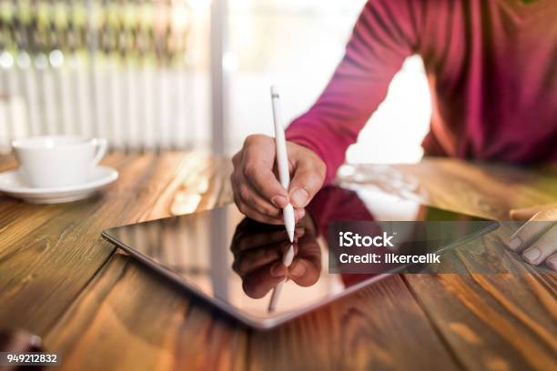 Signing Digital Document On Electronic Pad Stock Photo - Download Image Now - Digital Display, Signing, Sign