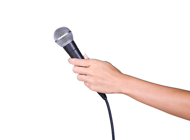 Holding a microphone stock photo