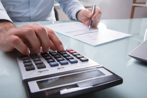 istock Businessperson Calculating Invoice 949215228