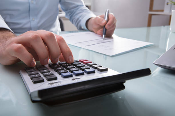 istock Businessperson Calculating Invoice 949215250
