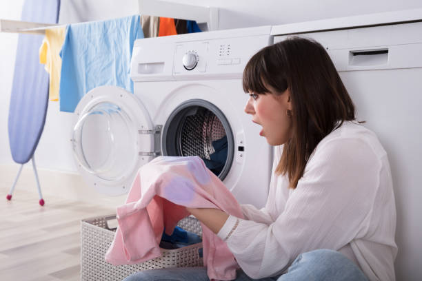istock Woman Looking At Stained Cloth 949218750
