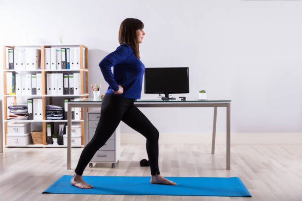 istock Businesswoman Doing Workout In Office 949219202
