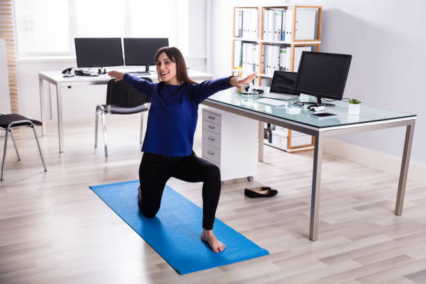 istock Businesswoman Doing Workout In Office 949219256