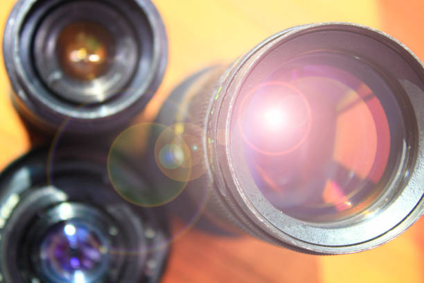 Photographic lens. Modern camera lenses with reflections. Modern camera lenses with reflections. Camera lens