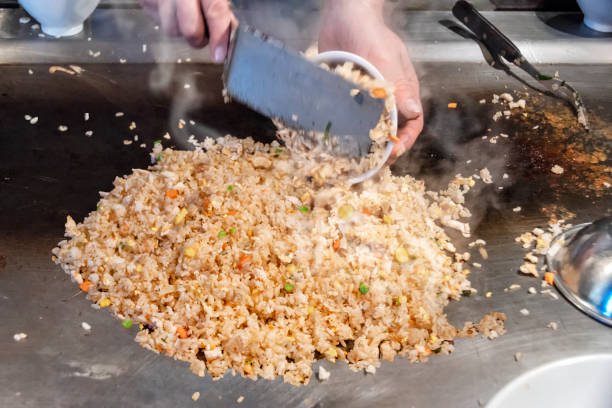 istock Preparing Asian food fried rice 949219326