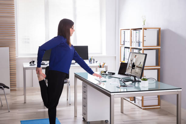 istock Young Businesswoman Doing Yoga 949219346