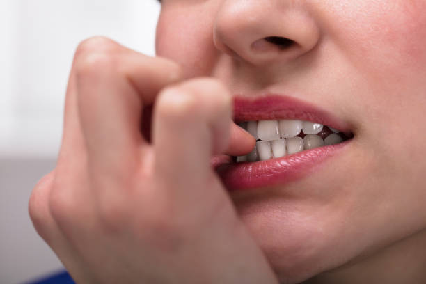 istock Businesswoman Biting Her Fingernail 949219782