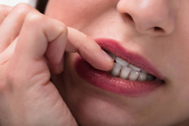 istock Businesswoman Biting Her Fingernail 949219792
