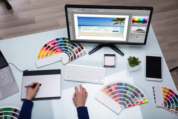 istock Elevated View Of Designer's Hand Working On Computer 949219842