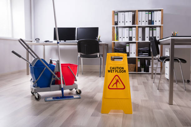 Wet Floor Caution Sign On Floor Wet Floor Caution Sign And Cleaning Equipments On Floor acrobatic activity photos stock pictures, royalty-free photos & images