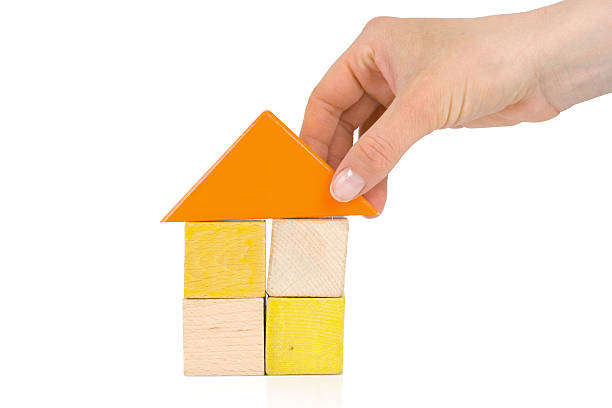 istock house made of wooden blocks 94921989