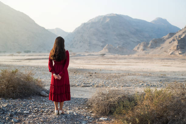 istock Girl enjoying dessert valley and mountain scenery 949219982