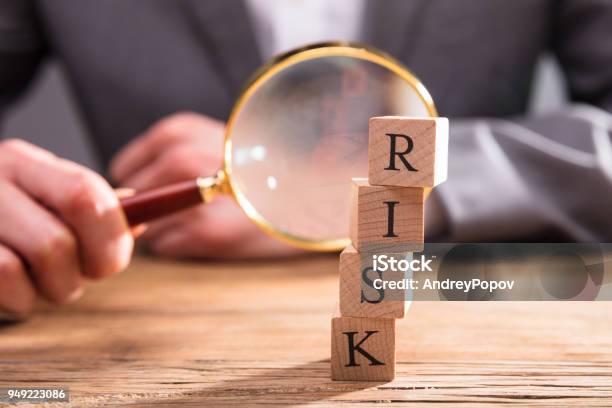 Closeup Of Wooden Blocks With Risk Word Stock Photo - Download Image Now - Risk, Finance, Analyzing