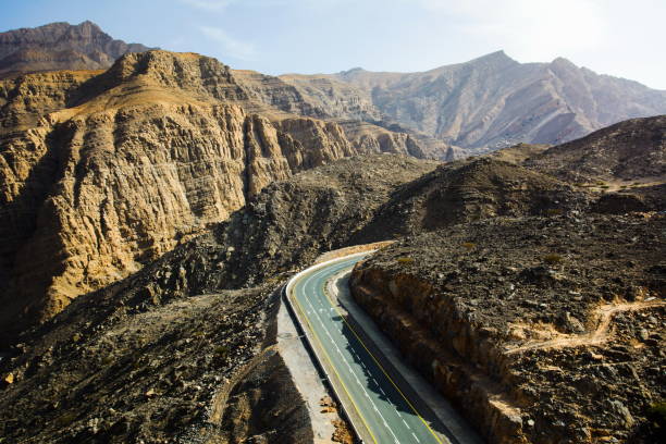 istock Jabal Jais mountain range and scenic road through the dessert 949223166
