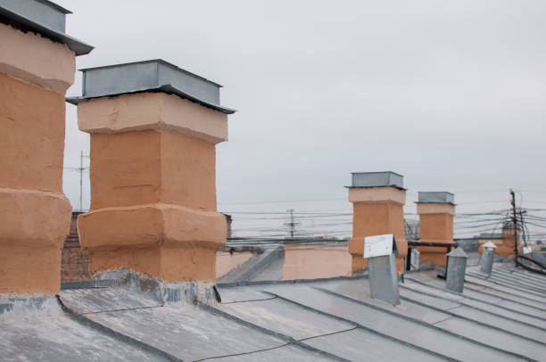 Chimneys on a roof of an old house stock photo