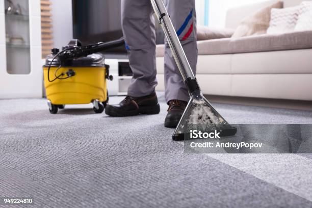 Person Cleaning Carpet With Vacuum Cleaner Stock Photo - Download Image Now - Cleaning, Carpet - Decor, Service