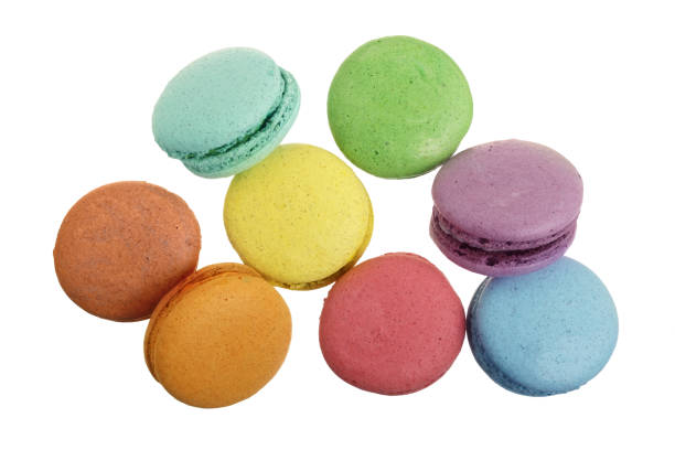 istock colored macarons isolated on white background without a shadow closeup. Top view. Flat lay 949227992