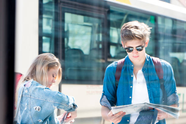 istock Young tourists in a city 949234616