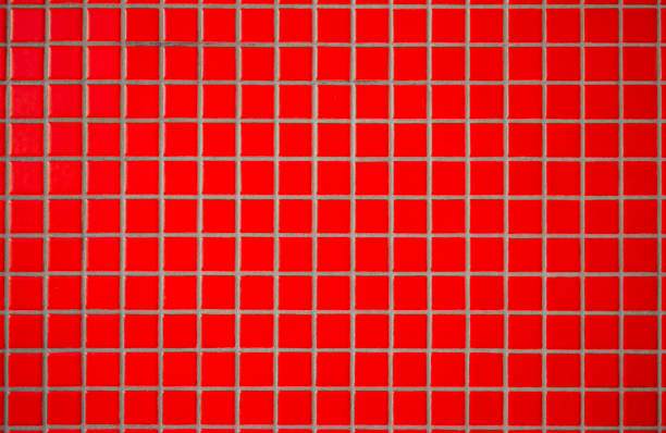 istock Red ceramic tiles with seams. Looks like a mosaic tiles. Abstract texture, pattern 949236048