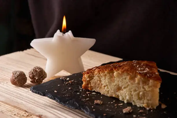 Photo of Delicious fresh baked piece of apple pie on shale board