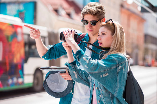 Young tourists in town Two young tourists walking around the city teenager couple child blond hair stock pictures, royalty-free photos & images