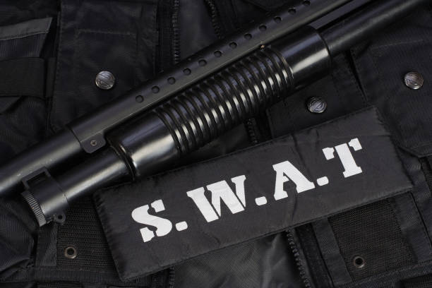 istock Special weapons and tactics team equipment on black background 949240486