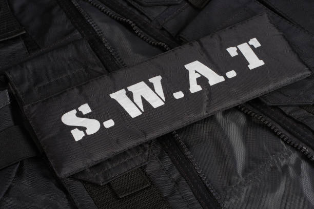 istock Special weapons and tactics team equipment on black background 949240568