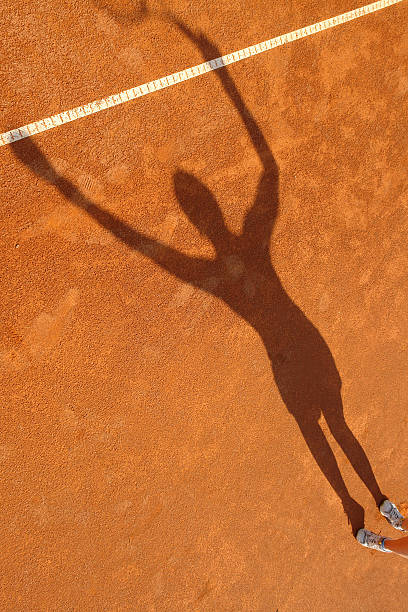 テニスコート - tennis serving female playing ストックフォトと画像