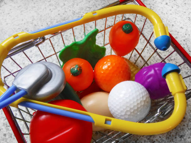 istock Children's educational toy plastic fruit and toy stethoscope in a shopping basket 949247972