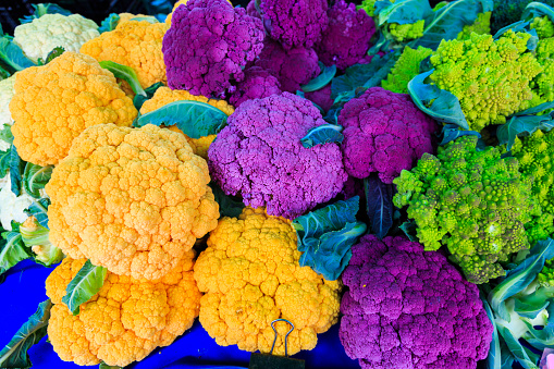 North America, United States, Oregon, Central Oregon, Redmond, Bend, Oregon. The Bend Farmers Market at Top of Mirror Pond Park in downtown. Colorful Cauliflower.