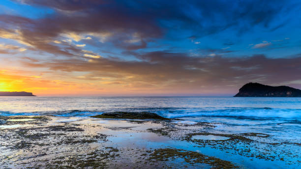 istock Vivid Sunrise Seascape 949252470