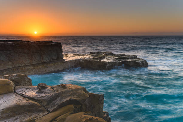 istock Sun rising over the Headland - Seascape 949252800
