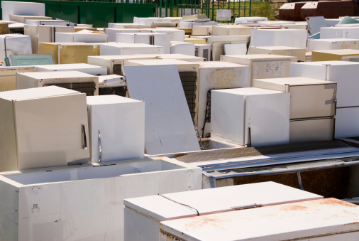 Rows of discarded fridges at the dump.