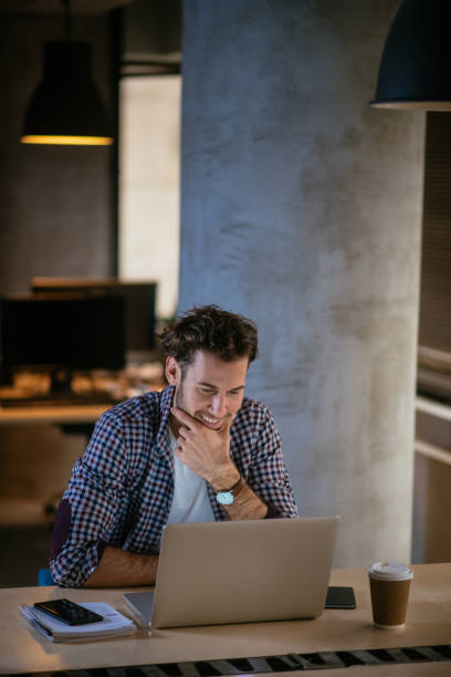 istock Man working on lap top in the office 949258326