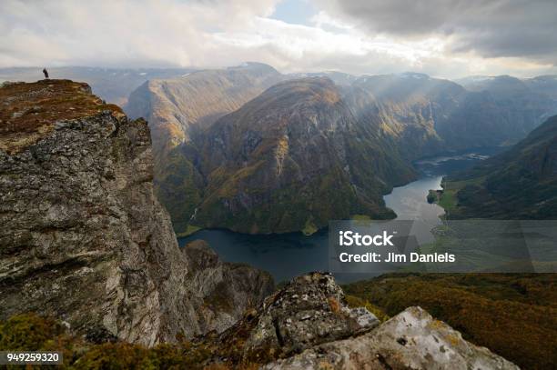 The Peak Of Breiskrednosi Over Nærøyfjord Stock Photo - Download Image Now - Fjord, Horizontal, In Silhouette