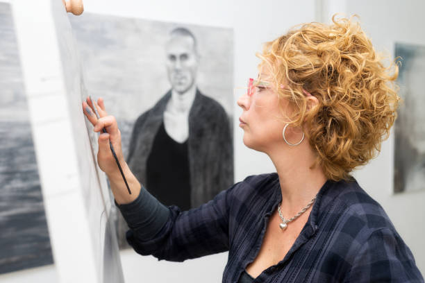istock Artist painting in the studio 949259830