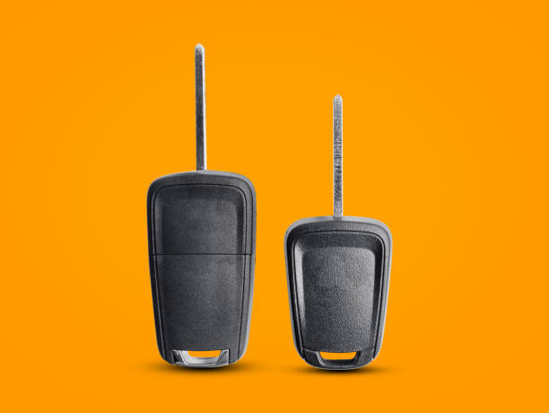 istock New keys car on orange background. 949264936