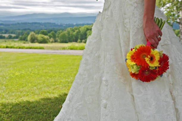 bright and colorful wedding bouquet in brides hands