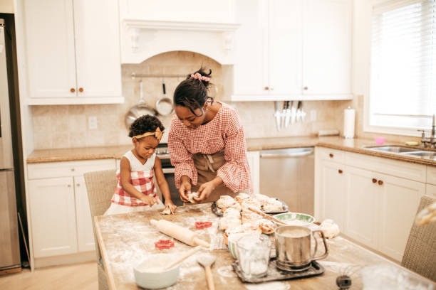 istock Mom and toddler baking together 949265518