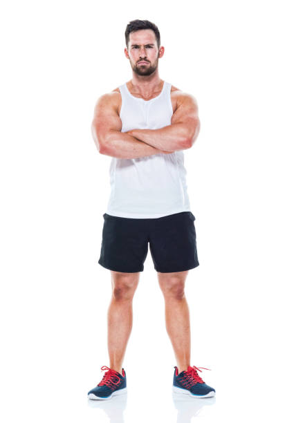 istock Athletic looking man with arms crossed 949269690