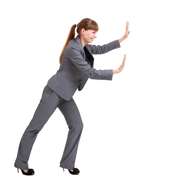 istock Business woman pushing something 94928483