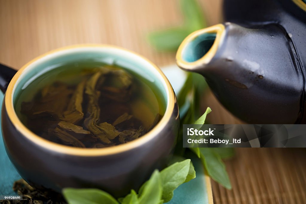 Green tea Green tea, cup and teapot Color Image Stock Photo