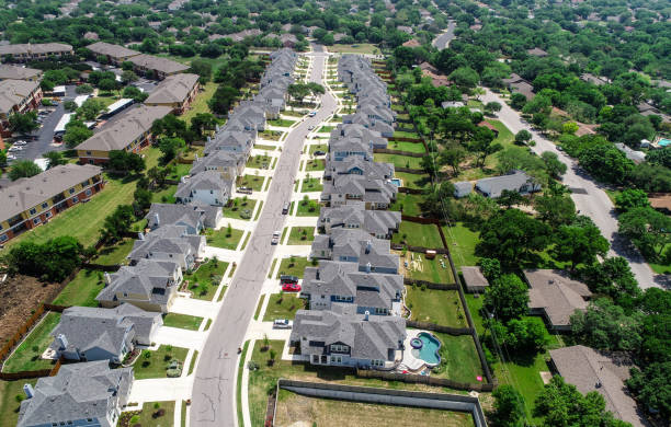 istock urban Suburb development North Austin homes and grey modern rooftops high up 949285874