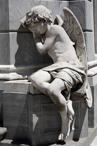 Angel sleeping in Buenos Aires cementary Recoleta  winged cherub stock pictures, royalty-free photos & images