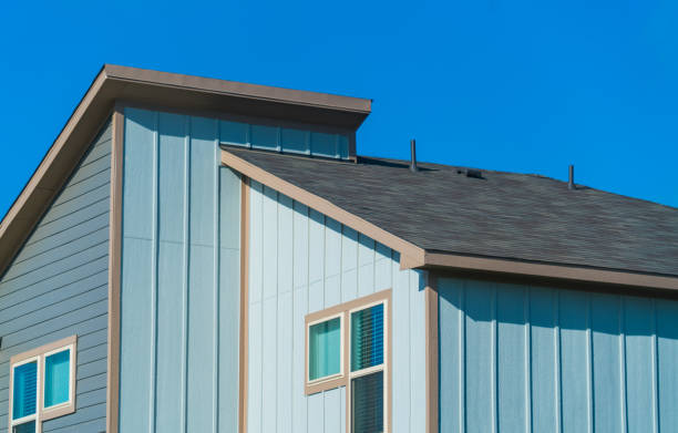 istock New Development Modern Architecture Houses in a Row blue painted walls on blue sky background 949295808